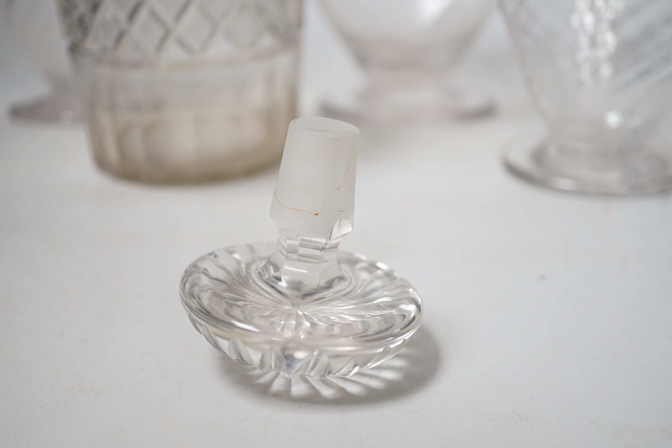 Two Victorian cut glass decanters, a ewer and a jug. Tallest 32cm